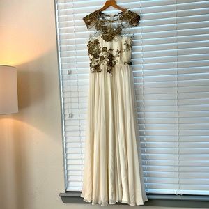 Wedding dress with handmade gold lace details